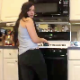 Aurelia is doing some cleaning in her kitchen when she starts to fart. She proceeds to the toilet where she takes a shit. The smell is so bad, it makes her gag. No poop is shown, but poop sounds are heard. Over 5 minutes.